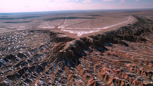 White Stupa Cliffs In Vast Gobi Mongolian Wilderness Landscape
