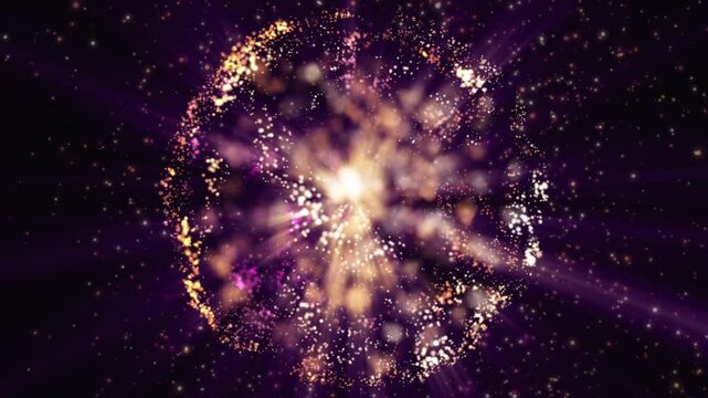 An abstract sphere of yellow, pink, and purple glowing particles on a dark background, with rays and dots spreading out from the center, creating the effect of a cosmic explosion or galaxy.