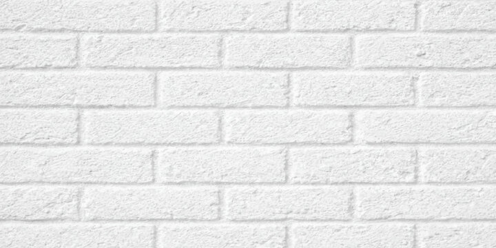 White brick wall texture featuring a solid stone pattern and grey grunge brickwork construction on an old cement building surface background