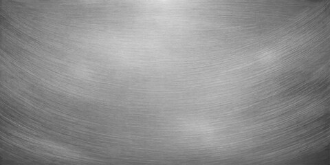 Fototapeta premium A polished silver stainless steel plate with a brushed metallic texture provides a shiny industrial grey surface pattern for a sleek aluminum material backdrop