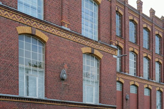 Industrial building (spinning mill), Historicism, 1905, Gescher, NRW, Germany, Vintage industrial red brick building facade with large arched windows.