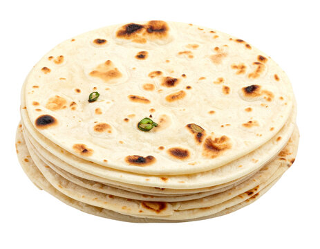 Stack of fresh chapatis with toasted spots and green chilies