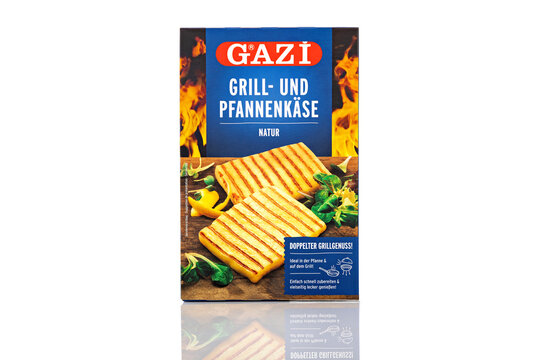 Studio image of Gazi Grill und Pfannenk&auml;se Natur cheese packaging on white background with reflection, commonly used for grilling and cooking dishes.
