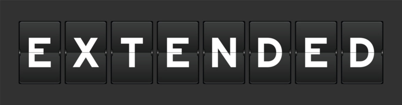 Black color analog flip board with word extended on gray background