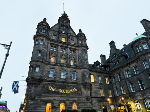 The Scotsman historic building in Edinburgh Scotland UK evening facade and ornate Victorian architecture on city street