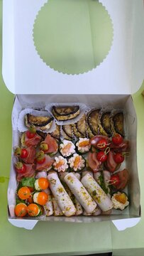 Freshly made sandwiches stacked on a counter in a busy deli.. Small business entrepreneur and food delivery concept