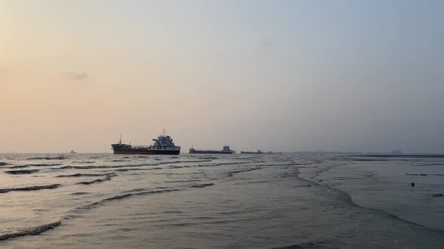 Golden Sunset at Parki Sea Beach with Cargo Ships Anchored in the Bay of Bengal, Chittagong