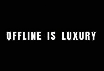 Obraz premium Minimalistic Typography Artwork Featuring the Phrase 'Offline is Luxury' in Bold White Letters on a Solid Black Background Emphasizing Digital Detox