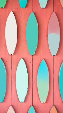 Pastel wooden surfboard cutouts pattern on pink plank background abstract summer concept