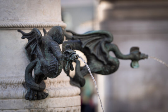 Basel, Switzerland, Basilisken-Brunnen, drinking fountain, Basilisken Fountain. The basilisk is the symbol of Basel. A mythical creature with a rooster's head. 