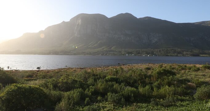 stormy sky over lagoon and Klein Mountains, Stanford, South Africa