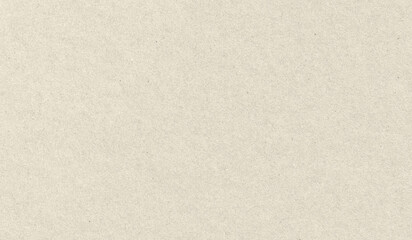 Beige paper texture background. Smooth surface of recycled cardboard with natural flecks. Vintage craft material for letter writing, document backdrop and creative graphic design