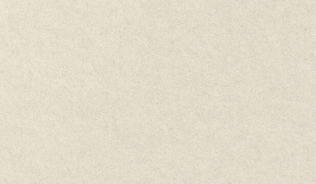 Beige paper texture background. Smooth surface of recycled cardboard with natural flecks. Vintage craft material for letter writing, document backdrop and creative graphic design