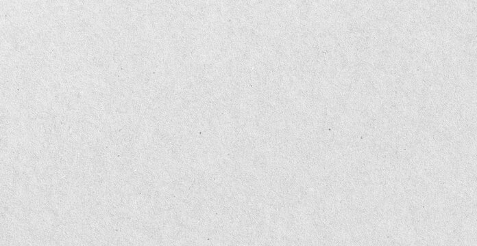 White recycled textured paper background. Empty cardboard page with rough surface pattern. Grainy stationary sheet material for artistic design, craft project and printing template
