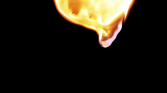 White paper edge slowly burns and curls with bright orange flames against a stark black isolated background. Concept of destruction, eliminating evidence, urgency, and irreversible change.
