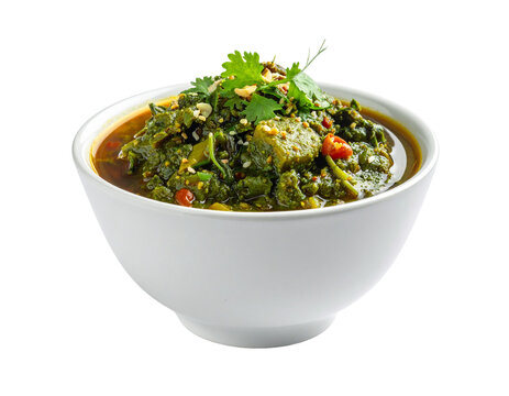 Savory spinach and kale chut with coriander garnish in white bowl