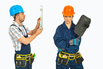 Fototapeta premium Two skilled workers stand ready for tasks