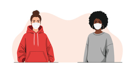 Fototapeta premium Social distancing and safety awareness featured by two diverse women wearing medical masks for health protection.