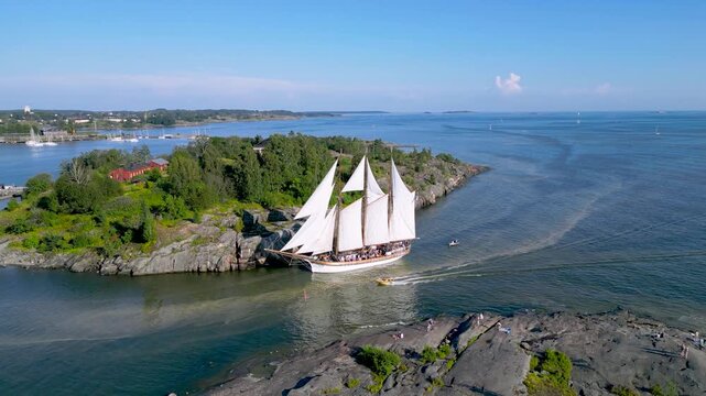Aerial Drone View of Kaivopuisto Waterfront and Harakka Island in Helsinki, Finland (Summer)