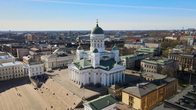 Beautiful aerial drone footage of Helsinki Cathedral (Tuomiokirkko) at Senate Square in Helsinki, Finland. 