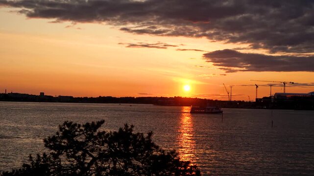 Timelapse video of a sunset over the Baltic Sea in Helsinki, Finland, captured from Pihlajasaari island.