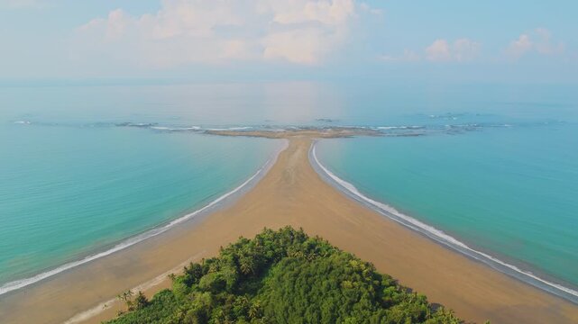 Famous Whale Tail sand formation and ocean at Marino Ballena National Park Costa Rica