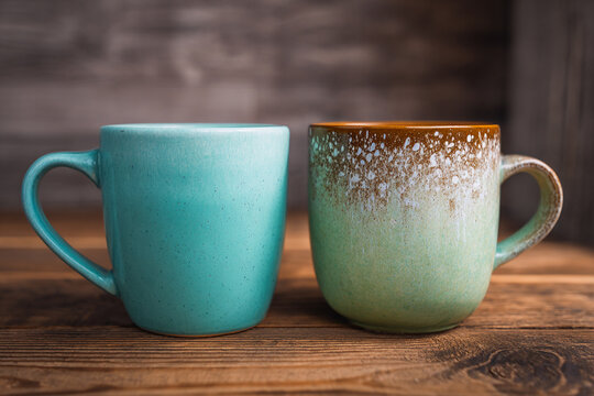 Two Stoneware Coffee Mugs, Drinking Coffee, Cafe, Coffee Shop, Teal and Green, Wood Surface