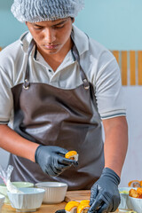 Chef preparing peruvian japanese fusion maki sushi © Guillermo Spelucin