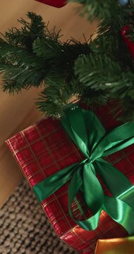Boxes, present and ribbon at house for Christmas surprise, celebration and holiday tradition. Tree, package and gift with bow for appreciation, secret santa and xmas decoration for festive season