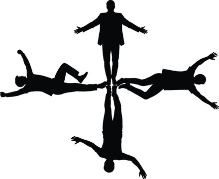 A person standing atop four others in a human pyramid formation