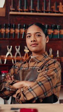 Woman, leathersmith or face with confidence in shop for fabric repair, design or restoration service. Portrait, female person or artisan with arms crossed for crafting in leather workshop or store