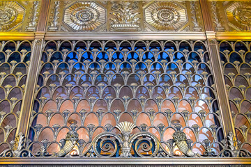 Fototapeta premium Ornate facade with fan motif metalwork details. Colonial heritage architecture in Toronto, Canada