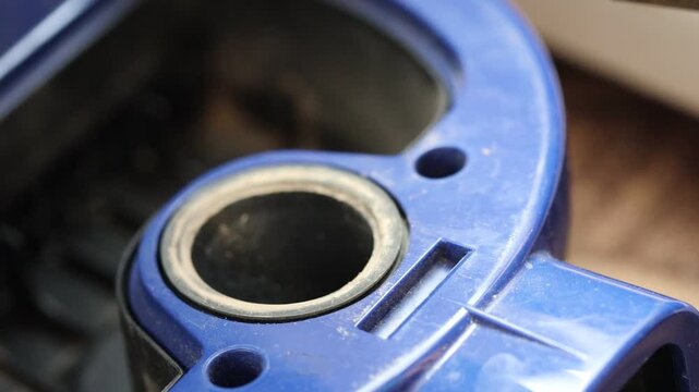 Close-up shot of a blue device sitting on a table, perfect for product demonstrations or tech-related concepts