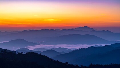 Obraz premium Breathtaking mountain range at sunset.