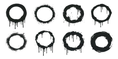 Set of black graffiti spray paint circles with drips vector illustration © GraphixEra