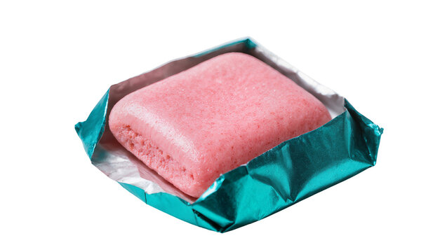 Pink rectangular chewing gum piece in teal foil wrapper, isolated on transparent background
