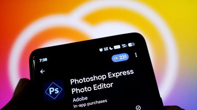 Closeup of a smartphone screen displaying the adobe photoshop express app store page
