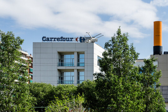 Barcelona, Spain - August 1, 2021. Logo and facade of Carrefour, a multinational distribution chain of French origin