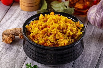 Indian yellow curry rice with tumeric