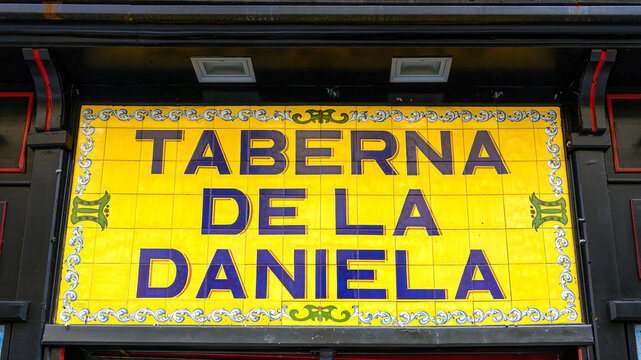 Colonial tile business sign in Madrid, Spain