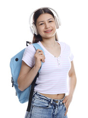Teenage girl in headphones with backpack on white background