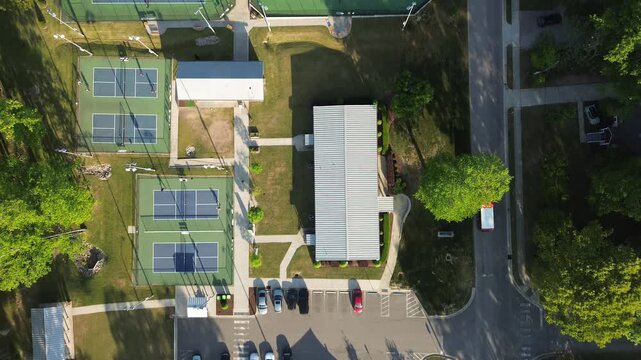Aerial view of Harper Park in downtown Knightdale, North Carolina, near Raleigh, with pickleball, tennis courts and a playground