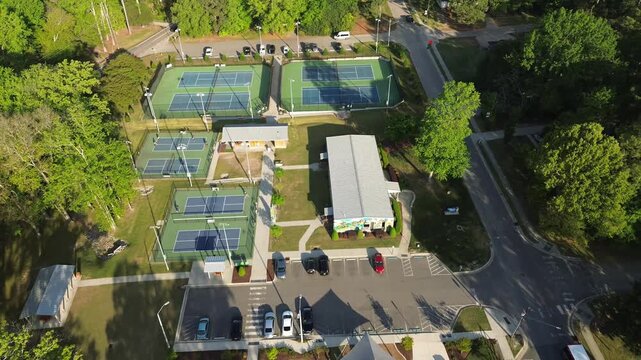 Aerial view of Harper Park in downtown Knightdale, North Carolina, near Raleigh, with pickleball, tennis courts and a playground