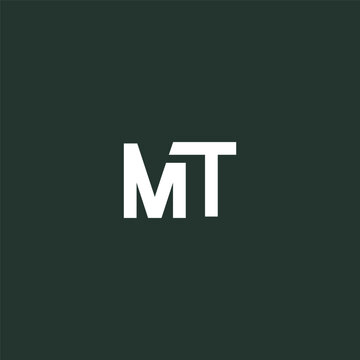 White MT letters on dark green background graphic resource