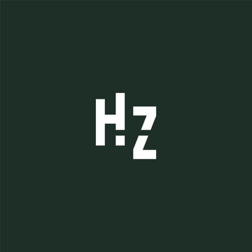 White Hz logo on dark green background