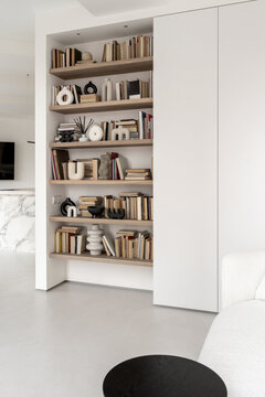 Light apartment in contemporary style with white and black furniture