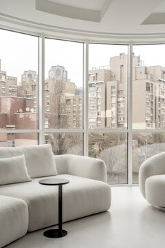 Light apartment in contemporary style with white and black furniture