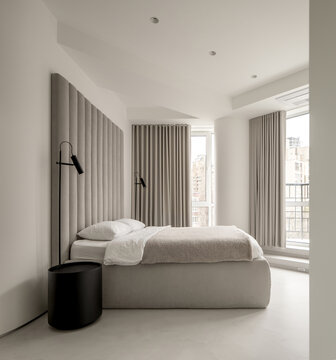 Light apartment in contemporary style with wall panelling