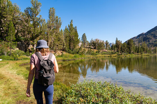 hiking on trail by a lake