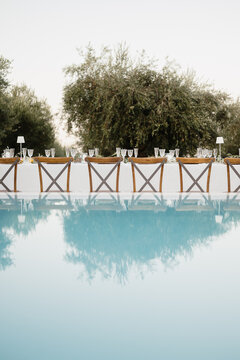 Elegant wedding decor by the pool in Italy